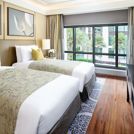 Siam Kempinski Hotel Bangkok Exterior photo Deluxe Room