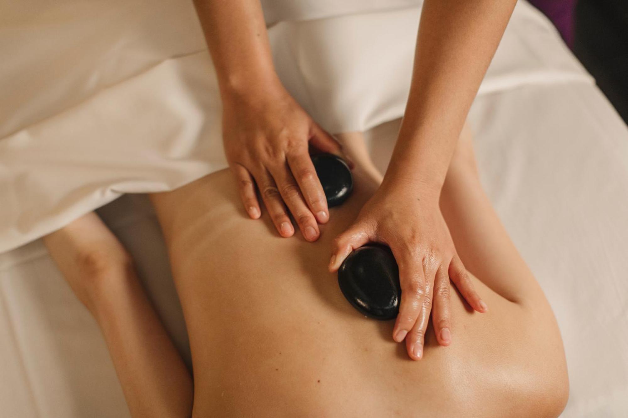Siam Kempinski Hotel Bangkok Exterior photo Hot stone massage